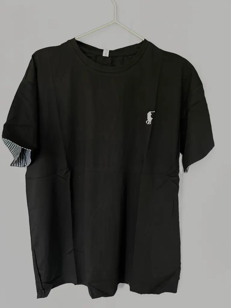 Polo Black 3 hanging.webp